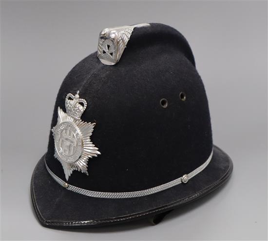 A Northumbrian Police helmet and truncheon
